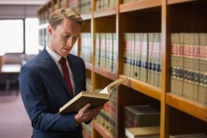 lawyer looks at book